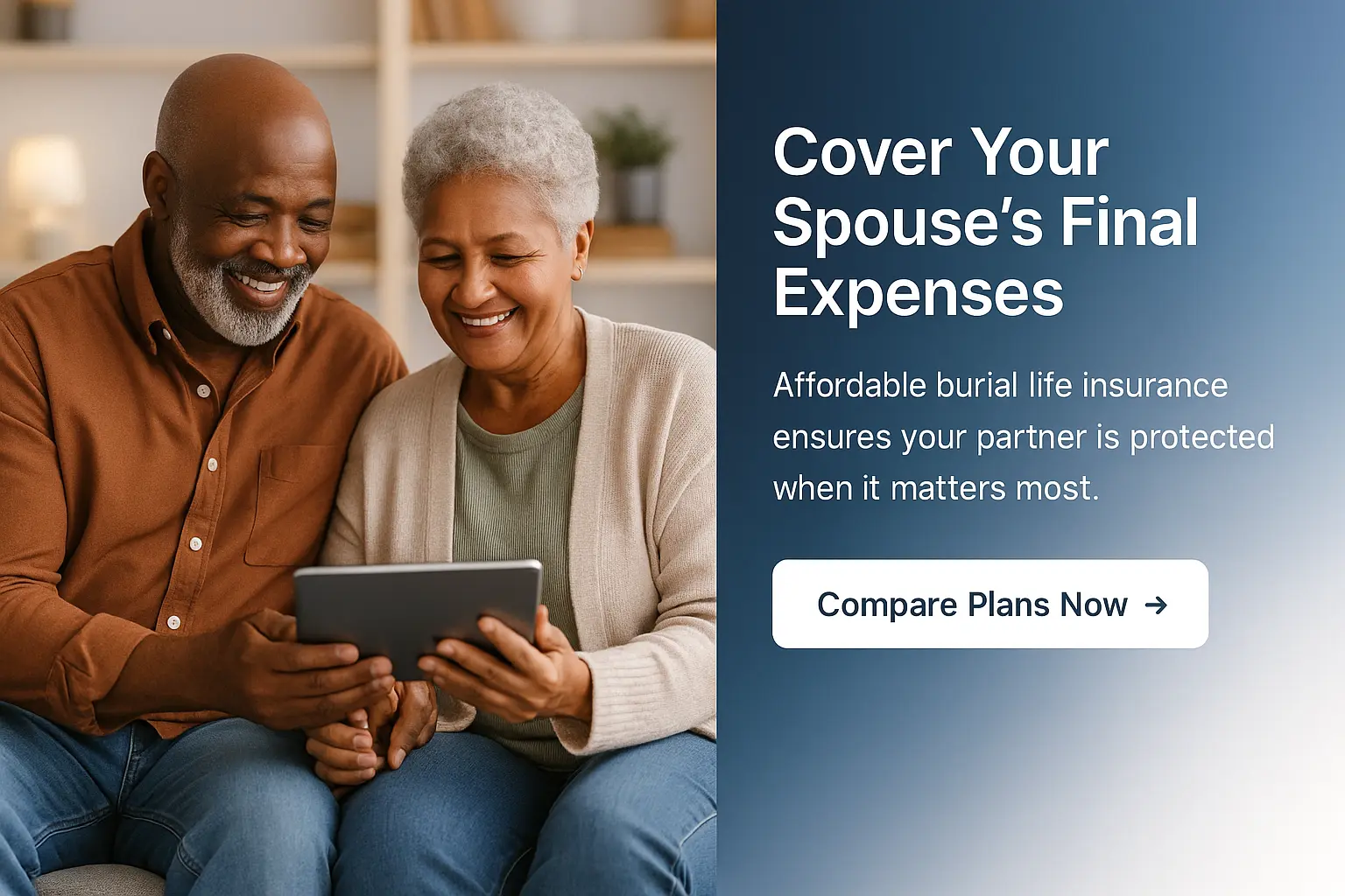 Senior couple sitting together on a living room sofa reviewing burial life insurance options on a tablet.